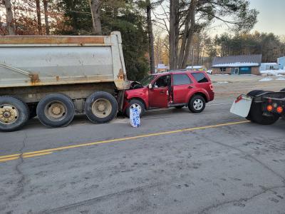 dump truck and ford escape at crash scene