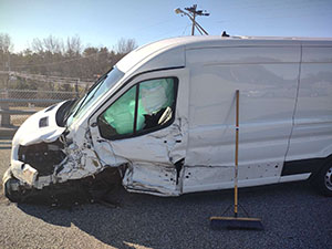 White motor van -front crash