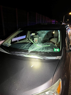 photo showing broken windshield