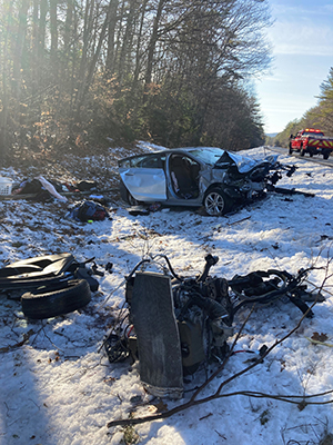 damaged chevrolet cruz at sanbornton crash scene