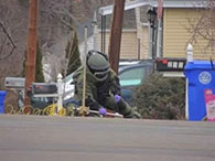 photo of trooper detonating explosive device