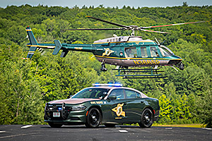 photo of special enforcement cruiser and helicopter