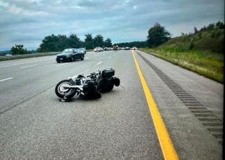 Motorcycle Crash Scene on Highway